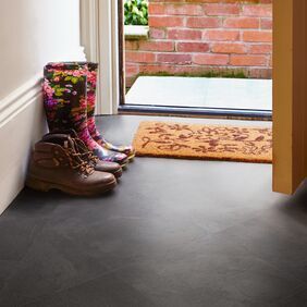 Entrance featuring stone effect flooring in Atlantic Slate using a 45° Straight laid, with half tile perimeter.