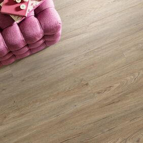Close up of pouffe featuring light wood effect flooring Quayside Oak 