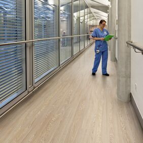 Oiled oak light wood effect flooring in a hospital corridor