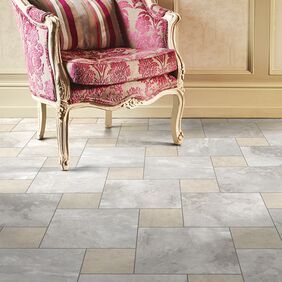 Antique chair featuring a stone effect flooring laid in a Off-set keysquare design, alongside White Metalstone with Grey Grouting Strip.