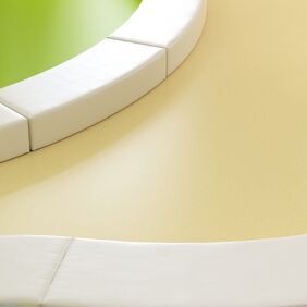 Close up image of a children's play room with neutral coloured flooring