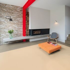 Contemporary living room with neutral coloured flooring 