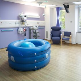 Light oak wood effect safey floorings in a water birthing room 