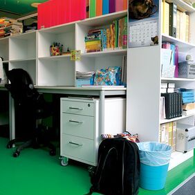 Office work station with green flooring