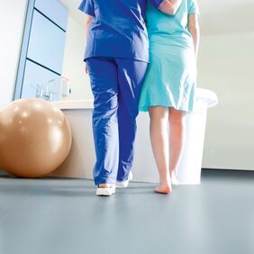 Light blue safety flooring in a Maternity birthing pool area 