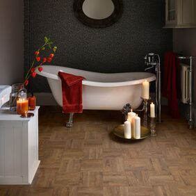 Modern bathroom featuring dark wood effect flooring Georgian Parquet