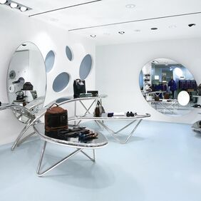 Modern style accessories shop with light blue flooring