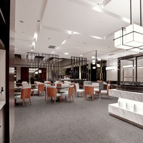 Dark grey coloured flooring in a restaurant with burnt orange coloured chairs and modern lighting