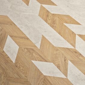 Close up of Miniature chevron White Metalstone tiles, alongside Sienna Oak. 