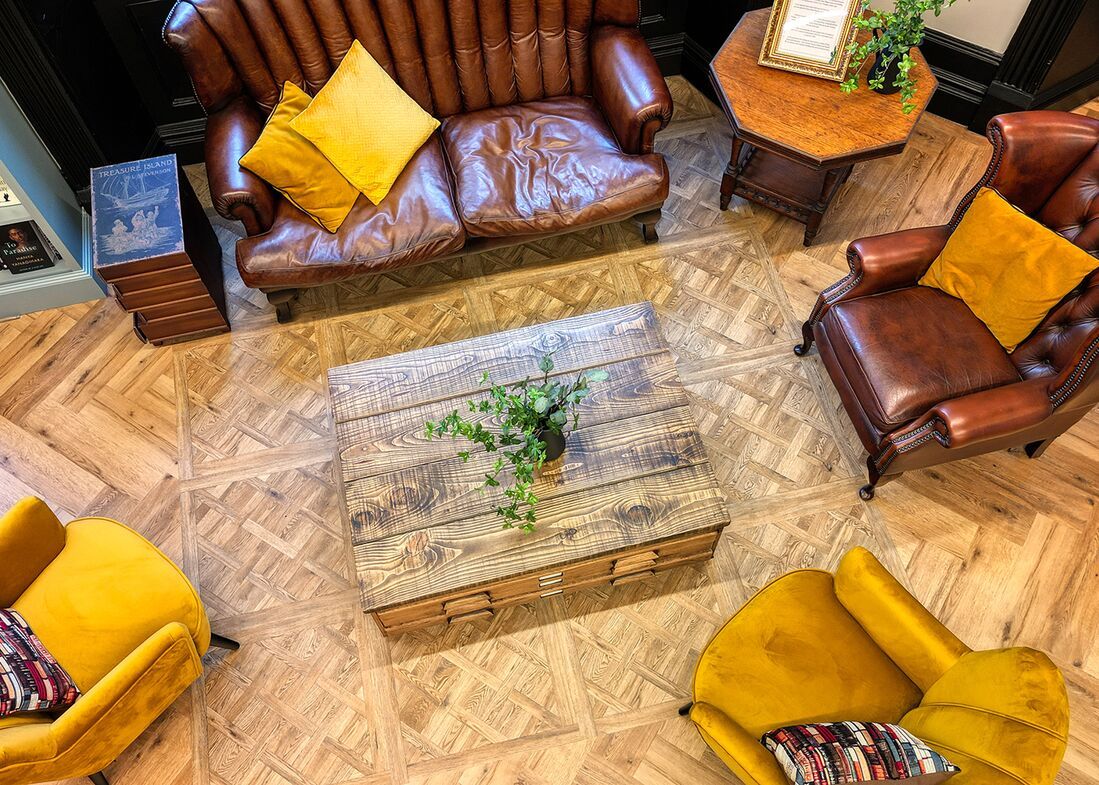House of books and friends in Manchester used Polyflor luxury vinyl flooring 