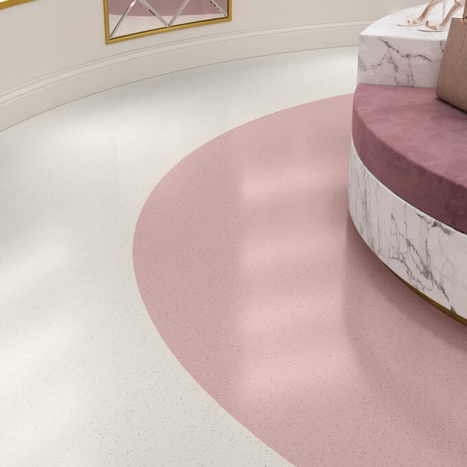 Cameo image showing the flooring in a designer handbag store