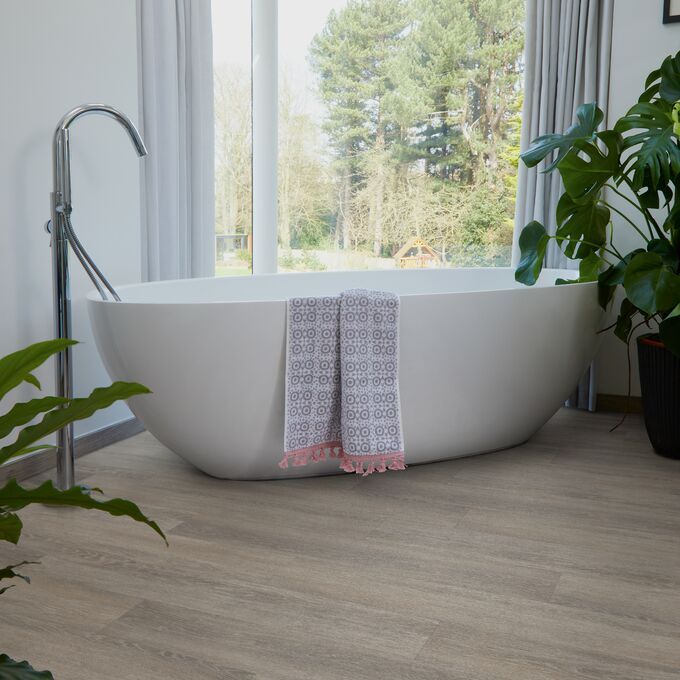 Bathroom, Bathtub, Widow, plants, wood flooring 