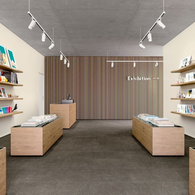 Dark coloured flooring laid in a retail book store
